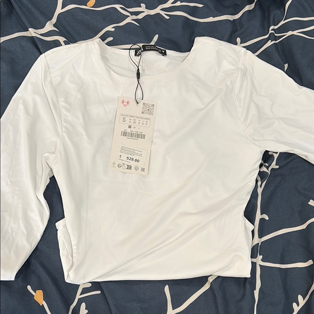 White backless bodysuit by Zara
